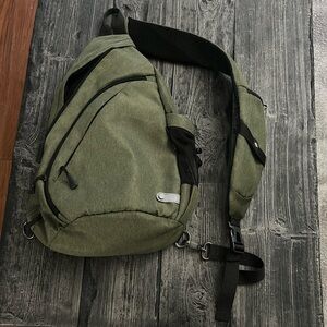 Over the shoulder bag has a charging outlet